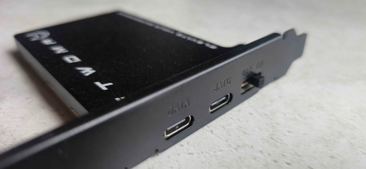 FTW DMA 100T Black Edition bracket with USB-C DATA and JTAG ports and an OFF/ON switch
