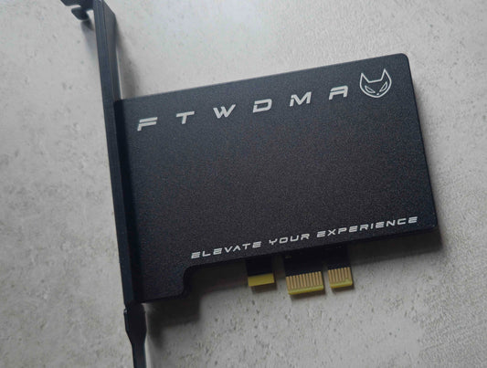 FTW DMA 100T Black Edition PCIe DMA card, angled view of the black aluminium shroud, bracket and PCIe x1 connector