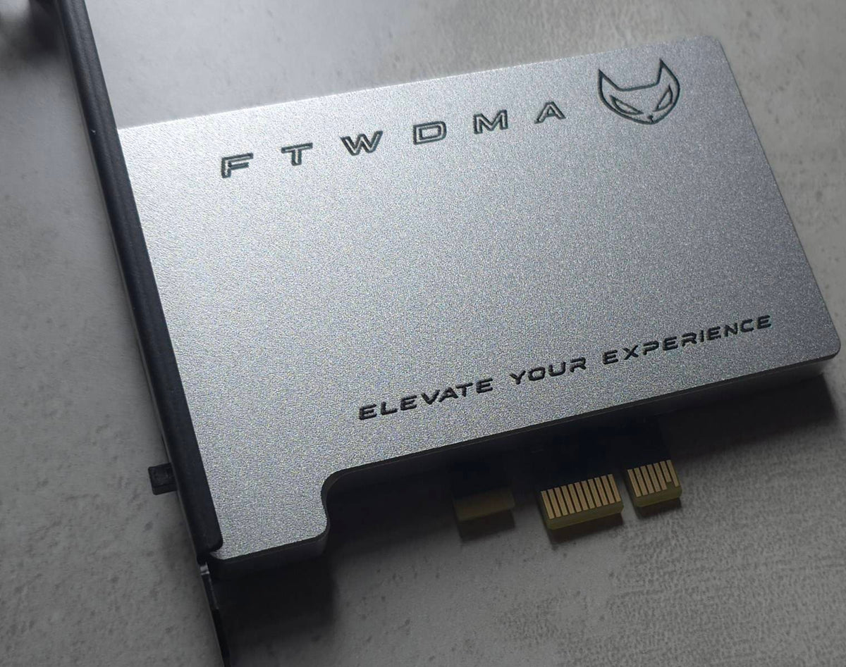 FTW DMA 100T Dual Firmware PCIe DMA card, silver aluminium shroud with PCIe x1 connector and bracket firmware switch